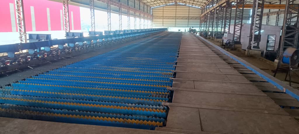 Cooling bed conveyor line inside an Odhav Group steel plant
